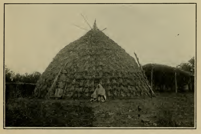 GRASS-THATCHED HOUSE OF THE WICHITA INDIANS